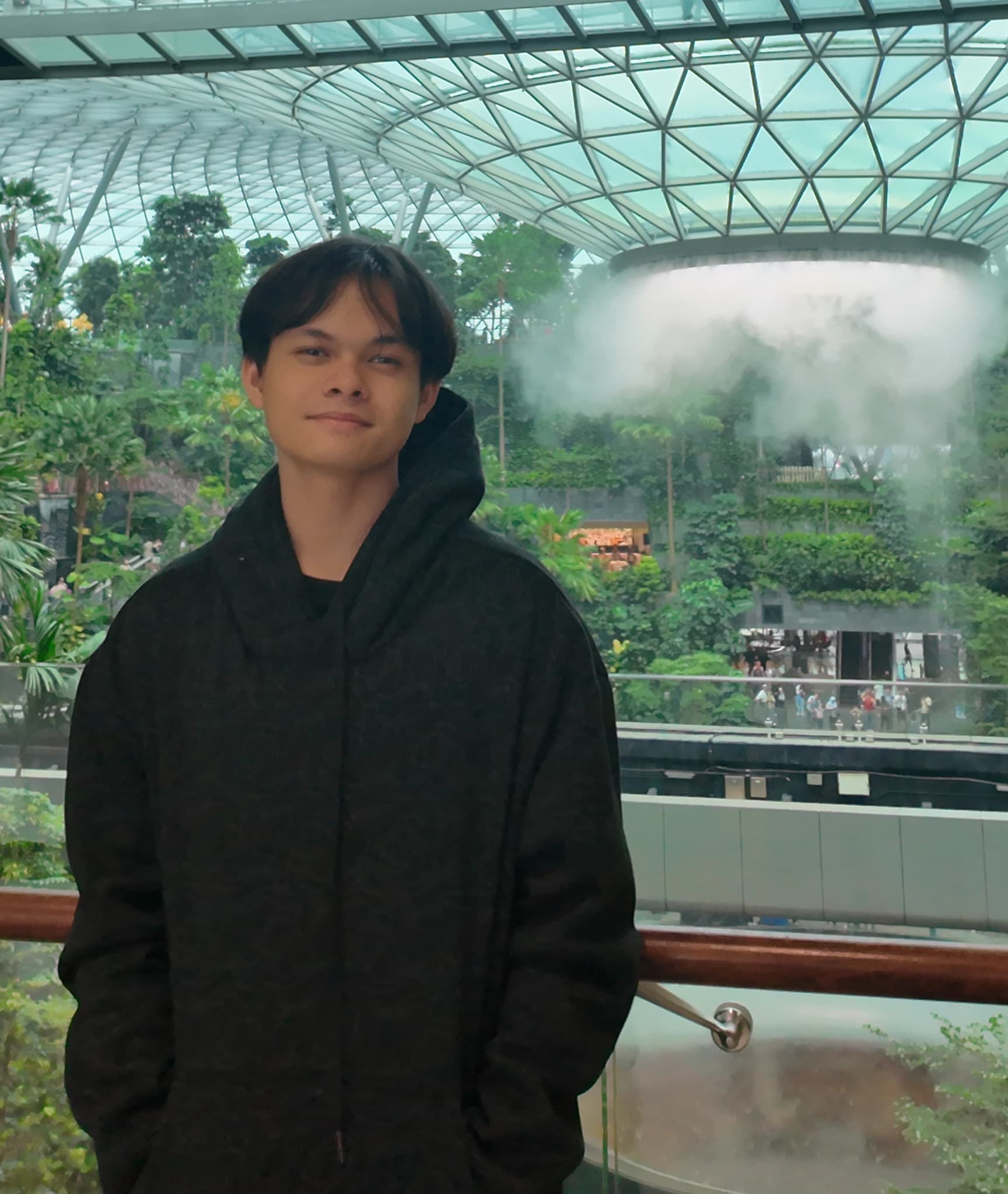 Ryne.dev standing at Changi Airport, Singapore